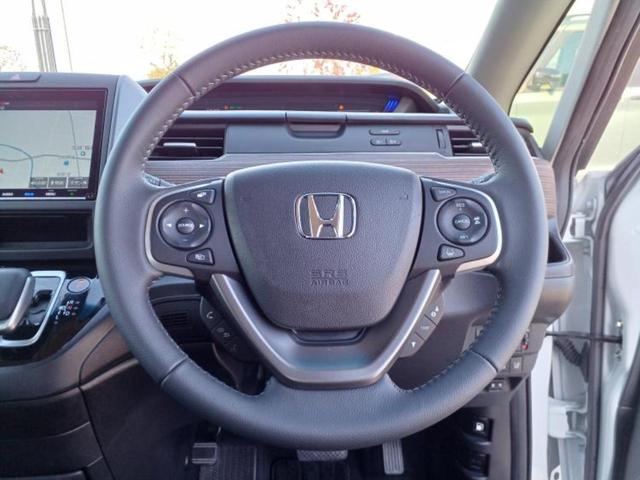 フリードハイブリッド ハイブリッドクロスターホンダセンシング　新品タイヤ／保証書／純正　９インチ　ＳＤナビ／衝突安全装置／両側電動スライドドア／車線逸脱防止支援システム／シート　ハーフレザー／パーキングアシスト　バックガイド／ヘッドランプ　ＬＥＤ　バックカメラ（31枚目）