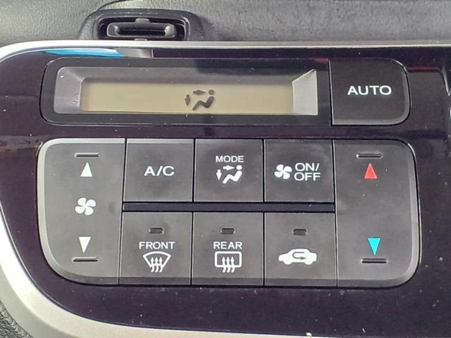 N-BOXカスタム G・Lパッケージ 新品タイヤ/保証書/社外 SDナビ/電動スライドドア/ヘッドランプ HID/ETC/EBD付ABS/横滑り防止装置/アイドリングストップ/バックモニター/フルセグTV/DVD/エアバッグ 運転席(12枚目)