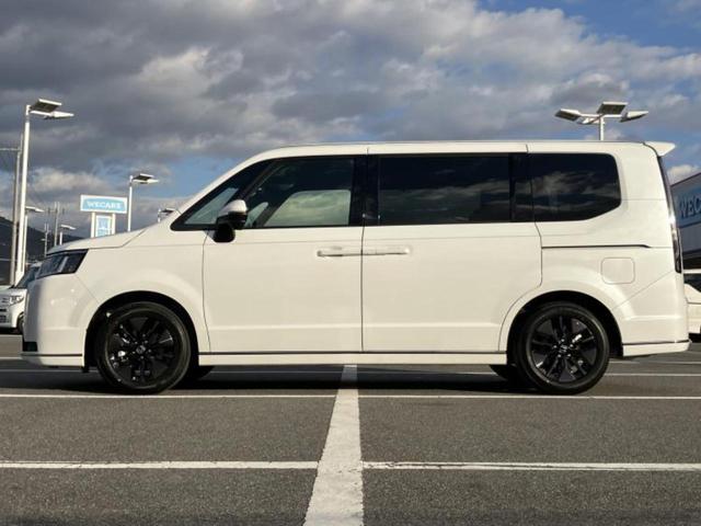 ステップワゴン スパーダ　保証書／純正　１１インチ　ナビ／フリップダウンモニター　純正　１５．６インチ／ホンダセンシング／両側電動スライドドア／シートヒーター　前席／車線逸脱防止支援システム／電動バックドア／登録済未使用車（2枚目）