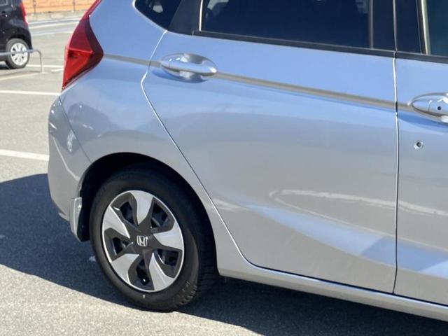 フィットハイブリッド ハイブリッド・Lホンダセンシング 新品タイヤ/純正 SDナビ/シート ハーフレザー/ヘッドランプ LED/Bluetooth接続/ETC/EBD付ABS/横滑り防止装置/アイドリングストップ/バックモニター/フルセグTV バックカメラ(5枚目)