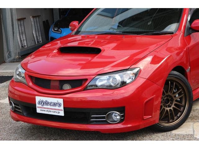 インプレッサ WRX STi ☆6速ミッション☆ナルディステアリング☆4WD☆RAYSボルクレーシングRE30☆5Jigenマフラー☆プッシュスタート&スマートキー☆ETC☆スペアタイヤ☆ナビテレビ(4枚目)