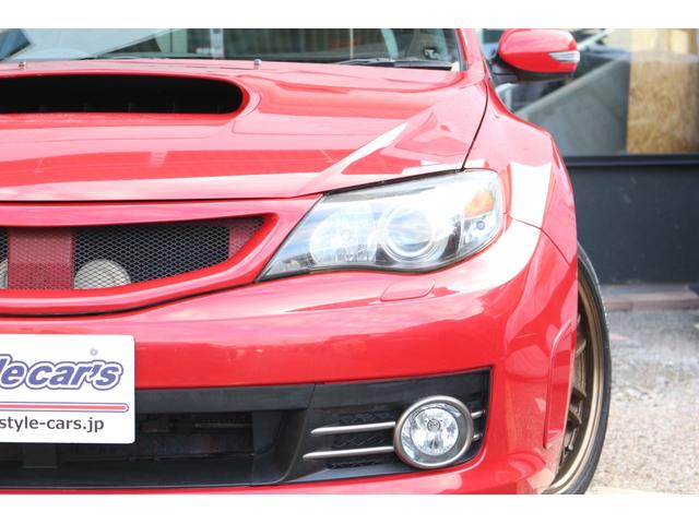 インプレッサ WRX STi ☆6速ミッション☆ナルディステアリング☆4WD☆RAYSボルクレーシングRE30☆5Jigenマフラー☆プッシュスタート&スマートキー☆ETC☆スペアタイヤ☆ナビテレビ(7枚目)
