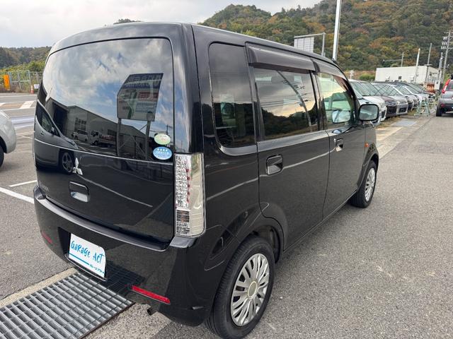 eKワゴン M セキュリティーアラーム エアB パワーステ エアコン 助手席エアバッグ キーレス フルフラット 衝突安全ボディ オートミラー パワーウィンド マニュアル(5枚目)
