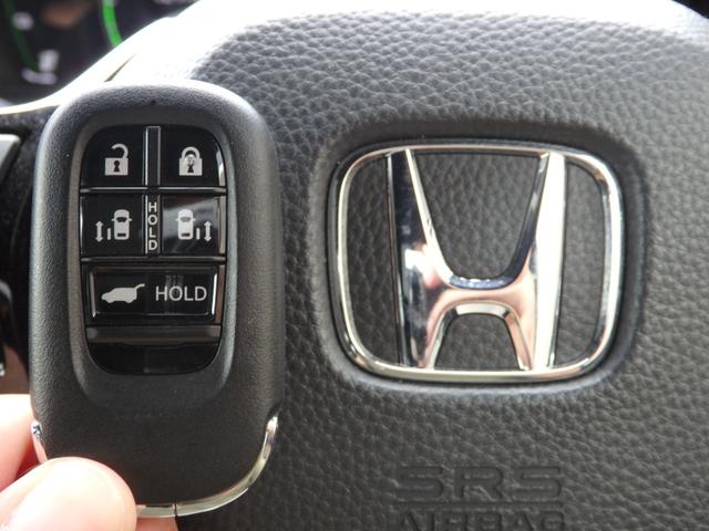 ステップワゴン ｅ：ＨＥＶスパーダ　プレミアムライン　禁煙車　純正１１．４型ナビ　Ｂカメラ　ＥＴＣ　ドラレコ前後　スマートキーＰスタート　両側パワスラ　後席１５．６型モニター　パワーバッグドア　パドルシフト　ハーフレザーシート　ＬＥＤオートライト（30枚目）