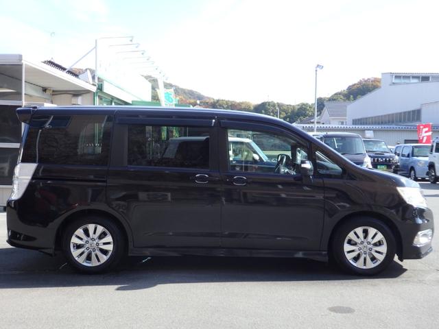 ステップワゴンスパーダ Ｚ　買取車両　純正ＨＤＤナビ　ＤＶＤ　ＣＤ　ＲＥＣ　ワンセグ　ＥＴＣ　Ｂカメラ　アルパイン製フリップダウンモニター　両側パワスラドア　パドルシフト　ＨＩＤライト　レザー調シートカバー　純正１６ＡＷ（5枚目）