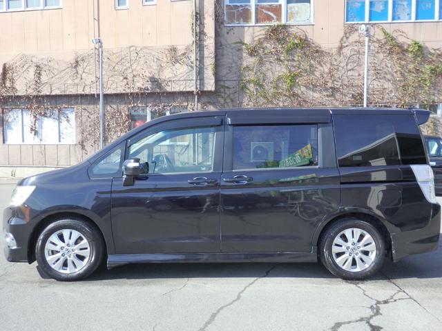 ステップワゴンスパーダ Ｚ　買取車両　純正ＨＤＤナビ　ＤＶＤ　ＣＤ　ＲＥＣ　ワンセグ　ＥＴＣ　Ｂカメラ　アルパイン製フリップダウンモニター　両側パワスラドア　パドルシフト　ＨＩＤライト　レザー調シートカバー　純正１６ＡＷ（6枚目）