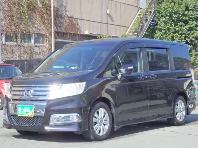 ステップワゴンスパーダ Ｚ　買取車両　純正ＨＤＤナビ　ＤＶＤ　ＣＤ　ＲＥＣ　ワンセグ　ＥＴＣ　Ｂカメラ　アルパイン製フリップダウンモニター　両側パワスラドア　パドルシフト　ＨＩＤライト　レザー調シートカバー　純正１６ＡＷ（8枚目）