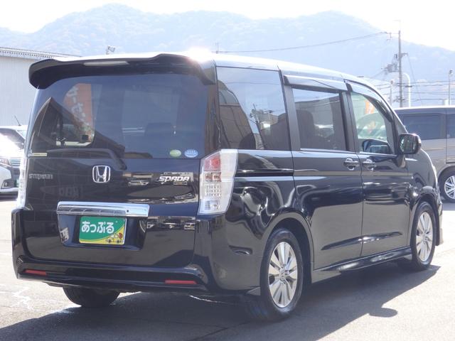ステップワゴンスパーダ Ｚ　買取車両　純正ＨＤＤナビ　ＤＶＤ　ＣＤ　ＲＥＣ　ワンセグ　ＥＴＣ　Ｂカメラ　アルパイン製フリップダウンモニター　両側パワスラドア　パドルシフト　ＨＩＤライト　レザー調シートカバー　純正１６ＡＷ（9枚目）