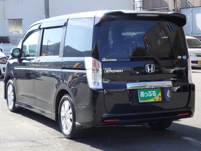 ステップワゴンスパーダ Ｚ　買取車両　純正ＨＤＤナビ　ＤＶＤ　ＣＤ　ＲＥＣ　ワンセグ　ＥＴＣ　Ｂカメラ　アルパイン製フリップダウンモニター　両側パワスラドア　パドルシフト　ＨＩＤライト　レザー調シートカバー　純正１６ＡＷ（10枚目）