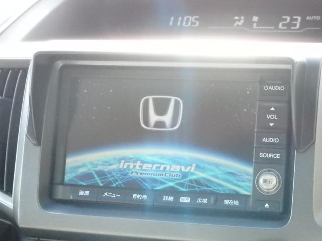 ステップワゴンスパーダ Ｚ　買取車両　純正ＨＤＤナビ　ＤＶＤ　ＣＤ　ＲＥＣ　ワンセグ　ＥＴＣ　Ｂカメラ　アルパイン製フリップダウンモニター　両側パワスラドア　パドルシフト　ＨＩＤライト　レザー調シートカバー　純正１６ＡＷ（12枚目）