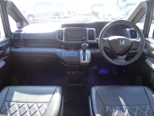 ステップワゴンスパーダ Ｚ　買取車両　純正ＨＤＤナビ　ＤＶＤ　ＣＤ　ＲＥＣ　ワンセグ　ＥＴＣ　Ｂカメラ　アルパイン製フリップダウンモニター　両側パワスラドア　パドルシフト　ＨＩＤライト　レザー調シートカバー　純正１６ＡＷ（18枚目）