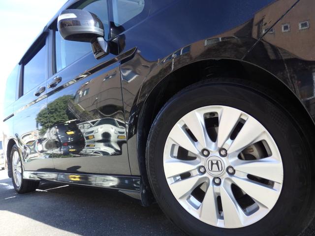 ステップワゴンスパーダ Ｚ　買取車両　純正ＨＤＤナビ　ＤＶＤ　ＣＤ　ＲＥＣ　ワンセグ　ＥＴＣ　Ｂカメラ　アルパイン製フリップダウンモニター　両側パワスラドア　パドルシフト　ＨＩＤライト　レザー調シートカバー　純正１６ＡＷ（22枚目）