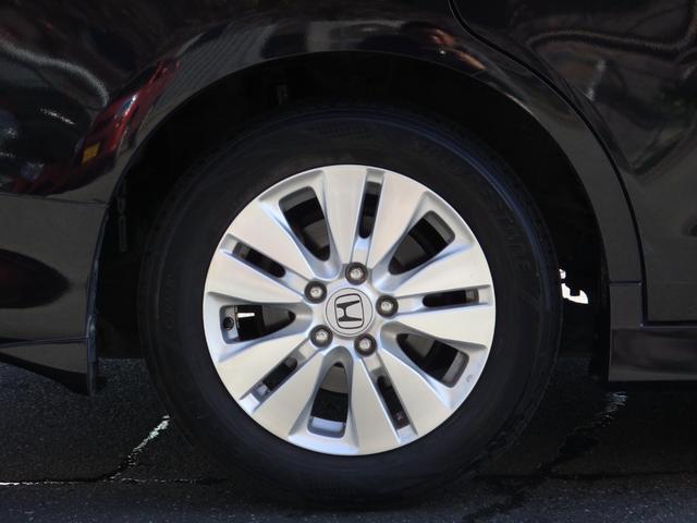 ステップワゴンスパーダ Ｚ　買取車両　純正ＨＤＤナビ　ＤＶＤ　ＣＤ　ＲＥＣ　ワンセグ　ＥＴＣ　Ｂカメラ　アルパイン製フリップダウンモニター　両側パワスラドア　パドルシフト　ＨＩＤライト　レザー調シートカバー　純正１６ＡＷ（23枚目）