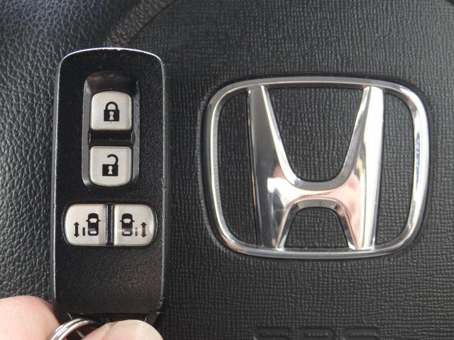 Ｎ－ＢＯＸカスタム Ｇ　ＳＳパッケージ　社外ナビ　Ｂカメラ　ＥＴＣ　両側パワスラ　スマートキーＰスタート　横滑り防止　Ｒサンシェード　オートエアコン　パワーウィンドウ　ウィンカー付き電格ミラー　社外マット　純正バイザー　純正１４インチＡＷ（29枚目）