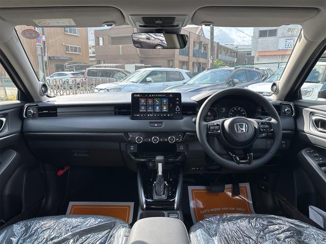 ヴェゼル e:HEV Z クリアランスソナー オートクルーズコントロール レーンアシスト 衝突被害軽減システム ナビ TV オートライト LEDヘッドランプ アルミホイール スマートキー アイドリングストップ 電動格納ミラー(2枚目)