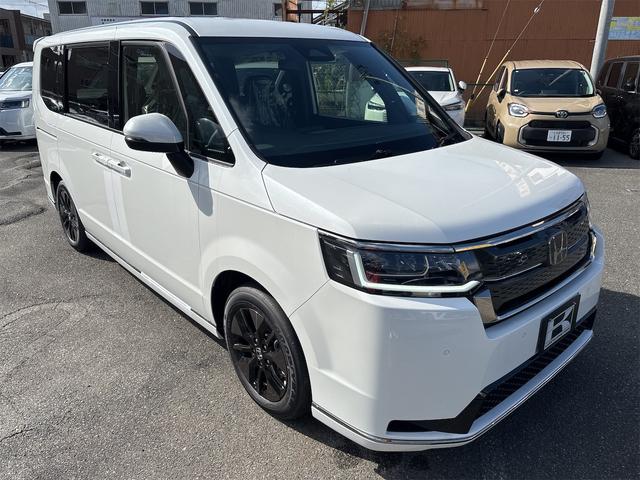 ステップワゴン スパーダ クリアランスソナー オートクルーズコントロール レーンアシスト 衝突被害軽減システム 両側電動スライドドア オートライト LEDヘッドランプ 電動リアゲート スマートキー アイドリングストップ(13枚目)