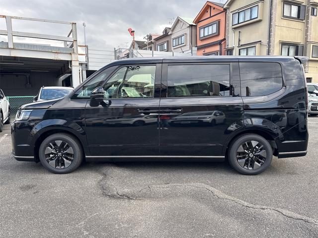 ステップワゴン e:HEVスパーダ クリアランスソナー オートクルーズコントロール レーンアシスト 衝突被害軽減システム 両側電動スライドドア オートライト LEDヘッドランプ 電動リアゲート スマートキー 電動格納ミラー(19枚目)