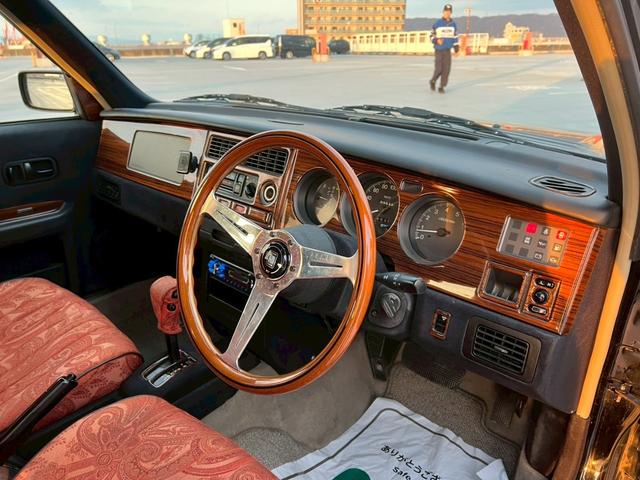 ラシーン タイプA 禁煙車・全塗装済・オリジナルブルー・マット塗装・ナルディ製ステアリングホイール・社外フロントグリル・木目パネル・社外アルミホイール・シートカバー・ETC・社外オーディオデッキ・FM/AM(24枚目)