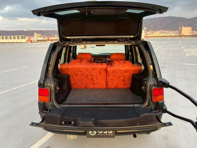 ラシーン タイプA 禁煙車・全塗装済・オリジナルブルー・マット塗装・ナルディ製ステアリングホイール・社外フロントグリル・木目パネル・社外アルミホイール・シートカバー・ETC・社外オーディオデッキ・FM/AM(39枚目)