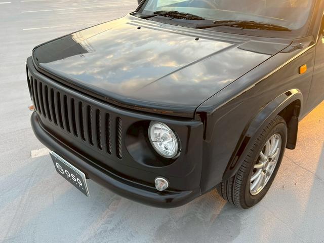 ラシーン タイプA 禁煙車・全塗装済・オリジナルブルー・マット塗装・ナルディ製ステアリングホイール・社外フロントグリル・木目パネル・社外アルミホイール・シートカバー・ETC・社外オーディオデッキ・FM/AM(57枚目)