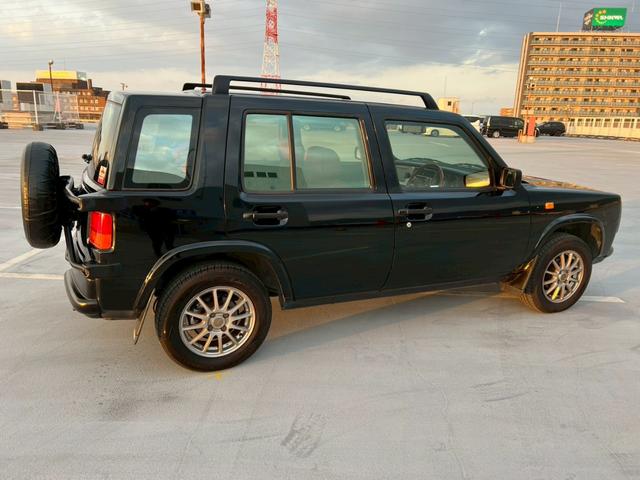 ラシーン タイプA 禁煙車・全塗装済・オリジナルブルー・マット塗装・ナルディ製ステアリングホイール・社外フロントグリル・木目パネル・社外アルミホイール・シートカバー・ETC・社外オーディオデッキ・FM/AM(69枚目)