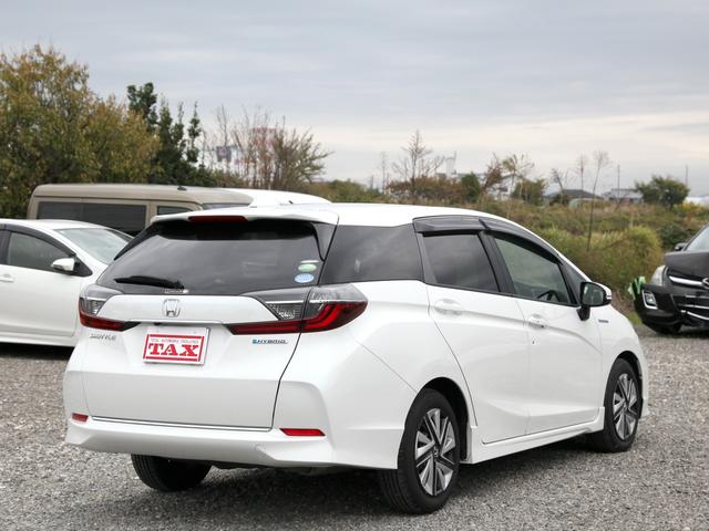 シャトル ハイブリッドX ホンダセンシング 純正8インチナビ/フルセグTV/バックカメラ/ETC/LEDヘッドライト/前後ドライブレコーダー/ハーフレザーシート/スペアキー/プッシュスタート/オートエアコン/ハイブリッド車(4枚目)