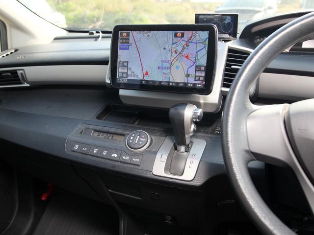 フリード Ｇ　ジャストセレクション　パナフロートナビ／フルセグ／Ｂカメラ／キャリア／ＥＴＣ／黒革調シートカバー／レーダー／Ｆドラレコ／両側パワースライドドア／電格／クルコン（6枚目）