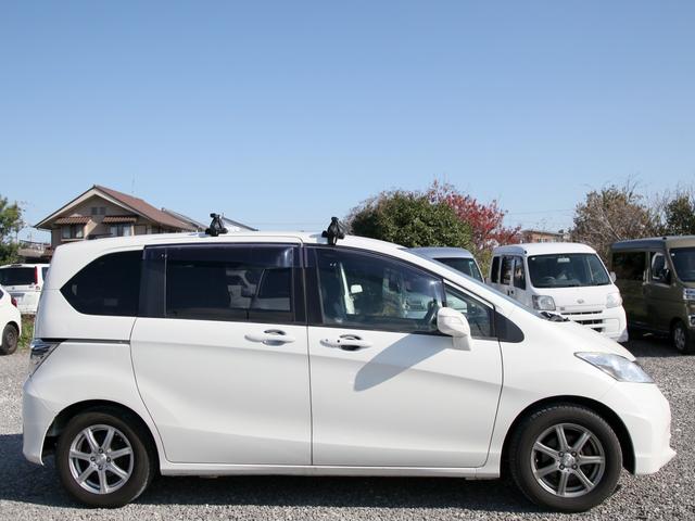 フリード Ｇ　ジャストセレクション　パナフロートナビ／フルセグ／Ｂカメラ／キャリア／ＥＴＣ／黒革調シートカバー／レーダー／Ｆドラレコ／両側パワースライドドア／電格／クルコン（27枚目）