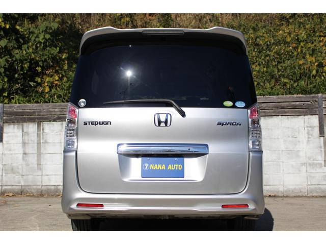 ステップワゴンスパーダ Ｚ　両側パワースライドドア　スマートキー　後席フィリップダウンモニター　オートライト　ＨＩＤヘッドライト　純正エアロパーツ　パドルシフト　純正ナビ　ワンセグＴＶ　ＣＤ録音　ＤＶＤ　ＥＴＣ　バックカメラ（10枚目）