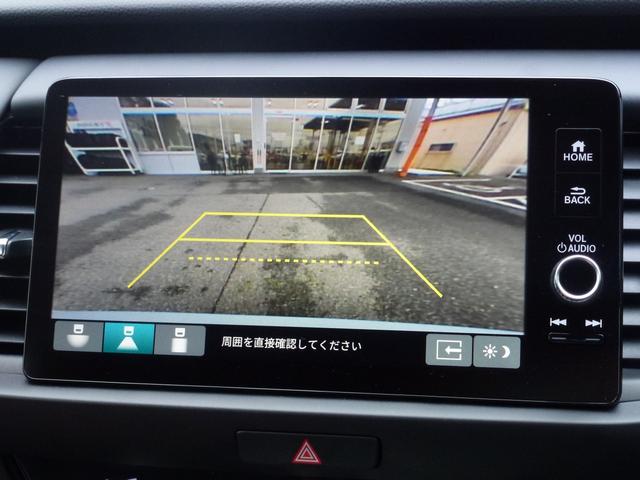 フィット ｅ：ＨＥＶホーム　当社元試乗車　工場オプションコネクトナビ搭載　フルセグＴＶ　ＢＴＡ　ＬＥＤヘツドライト　ホンダ純正前後ドライブレコーダー　サイドエアバッグ　サイドカーテンエアバッグ　ＵＳＢ接続　コンビシート　禁煙車（5枚目）