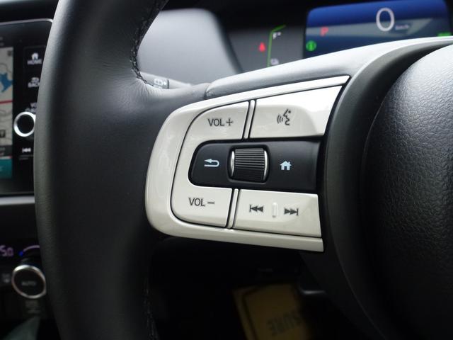 フィット ｅ：ＨＥＶホーム　当社元試乗車　工場オプションコネクトナビ搭載　フルセグＴＶ　ＢＴＡ　ＬＥＤヘツドライト　ホンダ純正前後ドライブレコーダー　サイドエアバッグ　サイドカーテンエアバッグ　ＵＳＢ接続　コンビシート　禁煙車（26枚目）