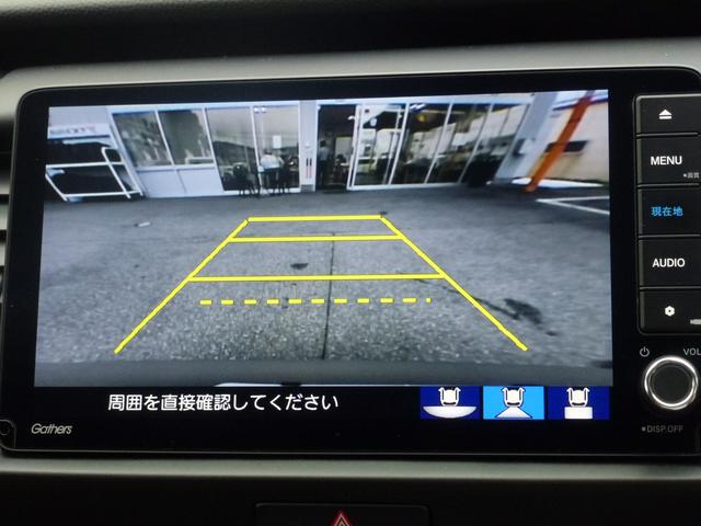 フィット ｅ：ＨＥＶホーム　ギャザズ９インチナビゲーション、ＣＤ／ＤＶＤ、フルセグＴＶ、Ｍラック、ＢＴＭ、ＵＳＢ、ＥＴＣ、ＬＥＢヘッドライト、サイドエアバッグ、サイドカーテンエアバッグ、革巻ハンドル、コンビシート、禁煙車（22枚目）