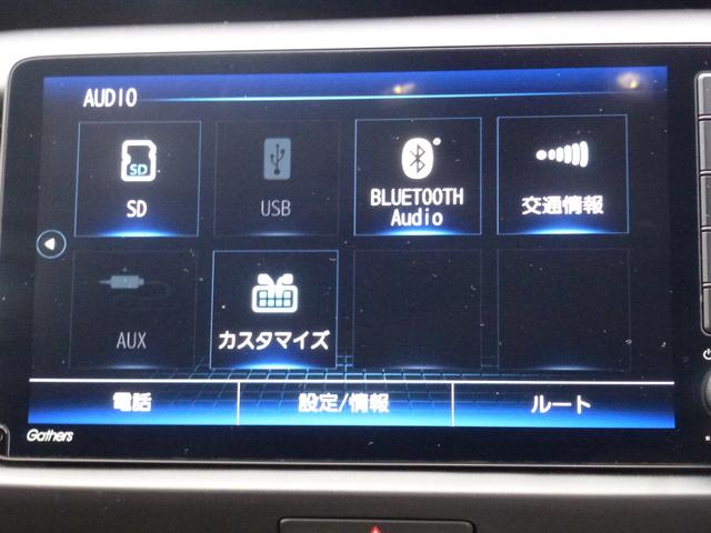 フィット ｅ：ＨＥＶホーム　ギャザズ９インチナビゲーション、ＣＤ／ＤＶＤ、フルセグＴＶ、Ｍラック、ＢＴＭ、ＵＳＢ、ＥＴＣ、ＬＥＢヘッドライト、サイドエアバッグ、サイドカーテンエアバッグ、革巻ハンドル、コンビシート、禁煙車（24枚目）