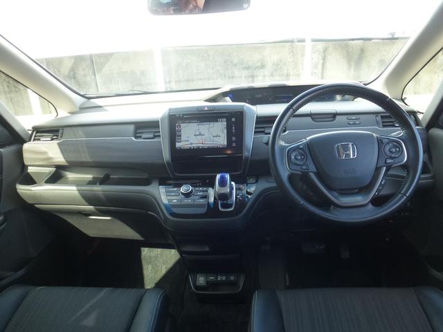 フリードハイブリッド ハイブリッド・Ｇホンダセンシング　メーカーオプションナビゲーション、フルセグＴＶ、ＢＴＡ、ＵＳＢ、ＨＤＭＩ、サイドエアバッグ＋サイドカーテンエアバッグ、ＥＴＣ、ホンダ純正フロントドライブレコーダー、ＬＥＢヘッドライト、７人乗り仕様（7枚目）