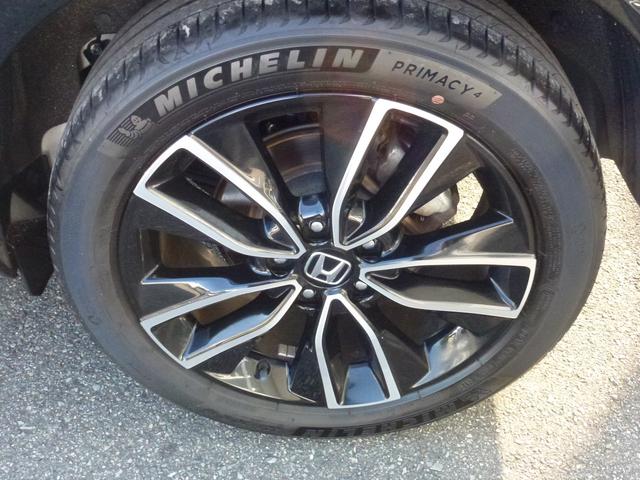 ヴェゼル e:HEVZ 純正9インチナビ ナビ連動ドライブレコーダー前後 パーキングセンサー パワーテールゲート 革巻きステアリング パドルシフト シートヒーター ETC 電子パーキングスイッチ CD/DVD(28枚目)