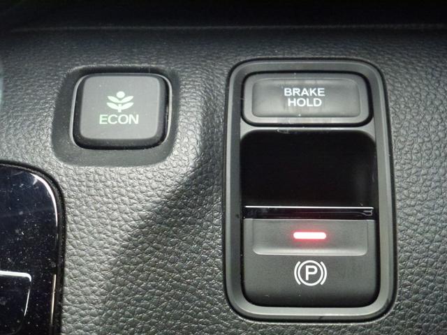 Ｎ－ＷＧＮカスタム Ｌ・ターボホンダセンシング　８インチ純正ナビ　ドライブレコーダー前後ナビ連動　ＥＴＣ　電子パーキングスイッチ　パドルシフト　パーキングセンサー　革巻きステアリング　ＣＤ／ＤＶＤ　フルセグ　Ｂｌｕｅｔｏｏｔｈ　ミュージックラック（24枚目）