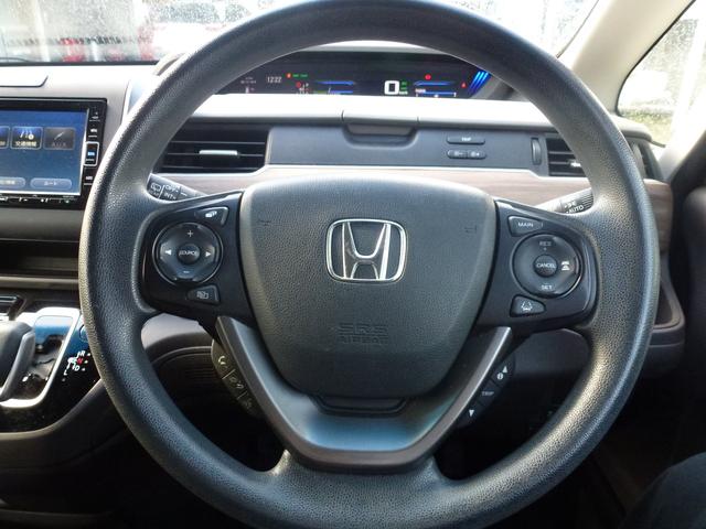 フリードハイブリッド ハイブリッド・Gホンダセンシング 7インチ純正ナビ 両側パワースライドドア LEDヘッドライト シートヒーター Bluetooth CD/DVD ミュージックラック USB ミュージックラック バックカメラ リヤ席サンシェイド(29枚目)