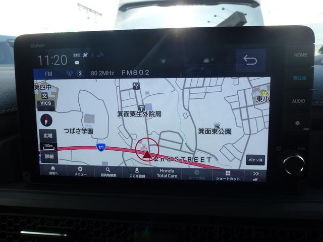 ステップワゴン e:HEVスパーダ 9インチ純正ナビ ETC シートヒーター パーキングセンサー 両側パワースライドドア パワーテールゲート パドルシフト バックカメラ シートバックテーブル 2列目オットマン ホンダセンシング(2枚目)