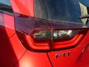 ｅ：ＨＥＶホーム　弊社元試乗車　９インチ純正ナビ　パーキングセンサー　ＥＴＣ　バックカメラ　ＬＥＤヘッドライト　革巻きステアリング　ＣＤ／ＤＶＤ　ＥＴＣ　フルセグ　Ｂｌｕｅｔｏｏｔｈ　ＵＳＢ　ミュージックラック（34枚目）