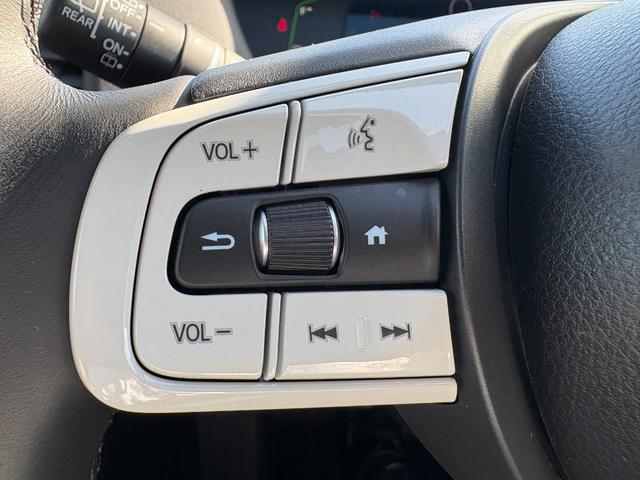 フィット ｅ：ＨＥＶホーム　純正ホンダコネクトナビ　Ｂｌｕｅｔｏｏｔｈ　ラジオ　フルセグ　バックカメラ　フルオートエアコン　ＡＣＣ　フロアマット　ＥＴＣ（23枚目）