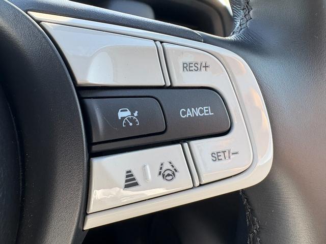 フィット ｅ：ＨＥＶホーム　純正ホンダコネクトナビ　Ｂｌｕｅｔｏｏｔｈ　ラジオ　フルセグ　バックカメラ　フルオートエアコン　ＡＣＣ　フロアマット　ＥＴＣ（24枚目）