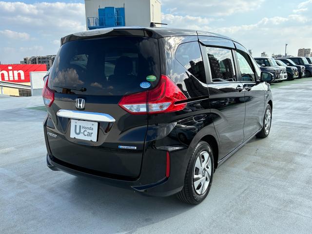 フリードハイブリッド ハイブリッド・Gホンダセンシング 純正9インチナビ CD DVD AM FM フルセグ Bluetooth バックカメラ ETC 両側電動パワースライドドア フルオートエアコン フロアマット ドアバイザー(10枚目)