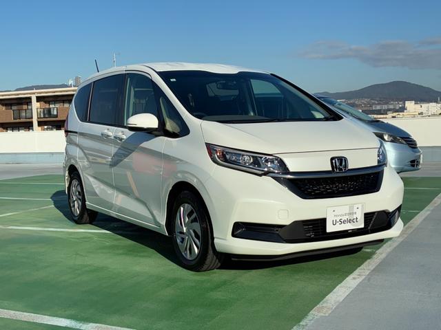 フリード Ｇ　純正７インチナビ　ＣＤ　ＤＶＤ　ＡＭ　ＦＭ　フルセグ　ミュージックラック　Ｂｌｕｅｔｏｏｔｈ　バックカメラ　フルオートエアコン　シートヒーター　両側電動パワースライドドア　後席サンシェード　ドラレコ（6枚目）