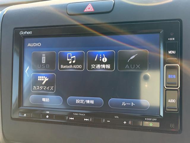 フリード Ｇ　純正７インチナビ　ＣＤ　ＤＶＤ　ＡＭ　ＦＭ　フルセグ　ミュージックラック　Ｂｌｕｅｔｏｏｔｈ　バックカメラ　フルオートエアコン　シートヒーター　両側電動パワースライドドア　後席サンシェード　ドラレコ（13枚目）