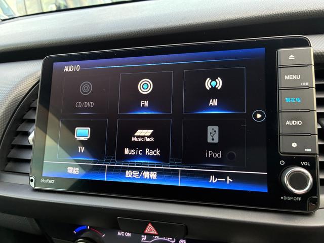 フィット ベーシック　純正ナビ　ＣＤ　ＤＶＤ　ＡＭ　ＦＭ　ＴＶフルセグ　ミュージックラック　Ｂｌｕｅｔｏｏｔｈ　バックカメラ　ブレーキホールド　フルオートエアコン　ＡＣＣ　ＥＴＣ（12枚目）