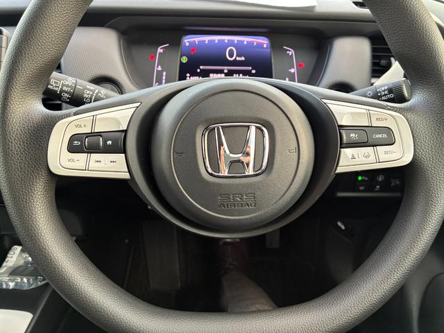 フィット ベーシック　純正ナビ　ＣＤ　ＤＶＤ　ＡＭ　ＦＭ　ＴＶフルセグ　ミュージックラック　Ｂｌｕｅｔｏｏｔｈ　バックカメラ　ブレーキホールド　フルオートエアコン　ＡＣＣ　ＥＴＣ（31枚目）