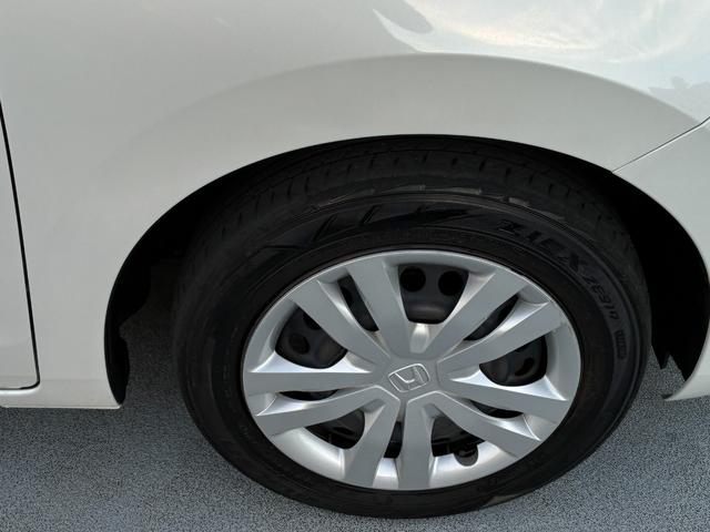 フィット ベーシック　純正ナビ　ＣＤ　ＤＶＤ　ＡＭ　ＦＭ　ＴＶフルセグ　ミュージックラック　Ｂｌｕｅｔｏｏｔｈ　バックカメラ　ブレーキホールド　フルオートエアコン　ＡＣＣ　ＥＴＣ（44枚目）
