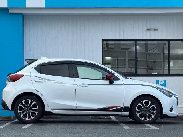 デミオ ＸＤツーリング　Ｌパッケージ　マツダコネクトナビ　ＥＴＣ　バックカメラ　６速ＭＴ　ベージュ半革シート　ステアリングスイッチ　クルーズコントロール　アイドリングストップ　ドライブレコーダー　衝突軽減システム　Ｂｌｕｅｔｏｏｔｈ接続（7枚目）