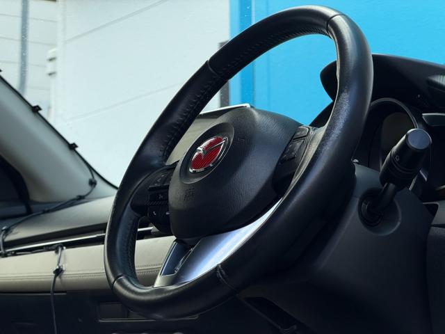 デミオ ＸＤツーリング　Ｌパッケージ　マツダコネクトナビ　ＥＴＣ　バックカメラ　６速ＭＴ　ベージュ半革シート　ステアリングスイッチ　クルーズコントロール　アイドリングストップ　ドライブレコーダー　衝突軽減システム　Ｂｌｕｅｔｏｏｔｈ接続（20枚目）