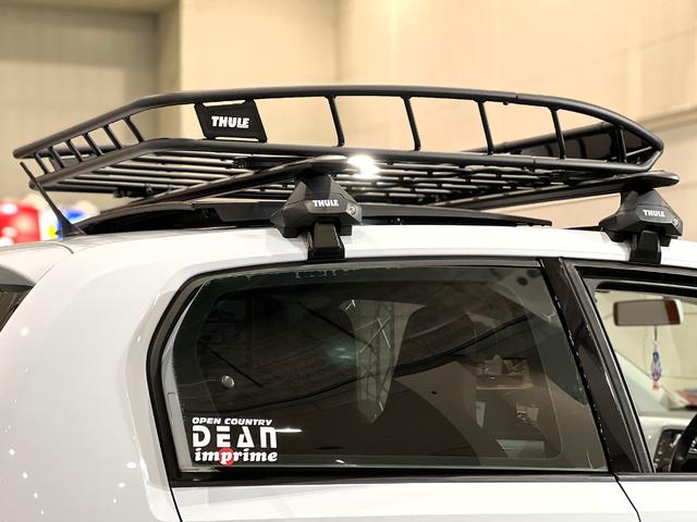 アップ! ハイ アップ! 2025年大阪モーターショー出展デモカー パノラマサンルーフ IMPLUSリフトアップスプリング 新品各パーツ(クリムゾンDEANアルミホイール TOYOホワイトリボンタイヤ THULEルーフバスケット) 前後バンパーカスタムペイント 禁煙車(77枚目)